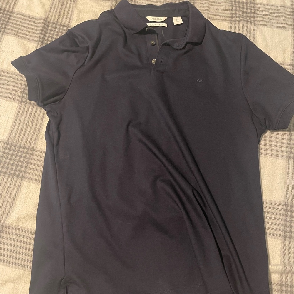 Calvin klein button up t shirt.